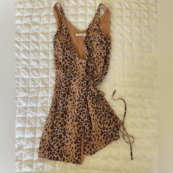 Reformation Dresses & Skirts - Reformation anchorage feline mini wrap dress